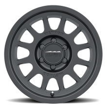 Load image into Gallery viewer, Method MR703 17x8.5 +25mm Offset 6x135 87mm CB Matte Black Wheel